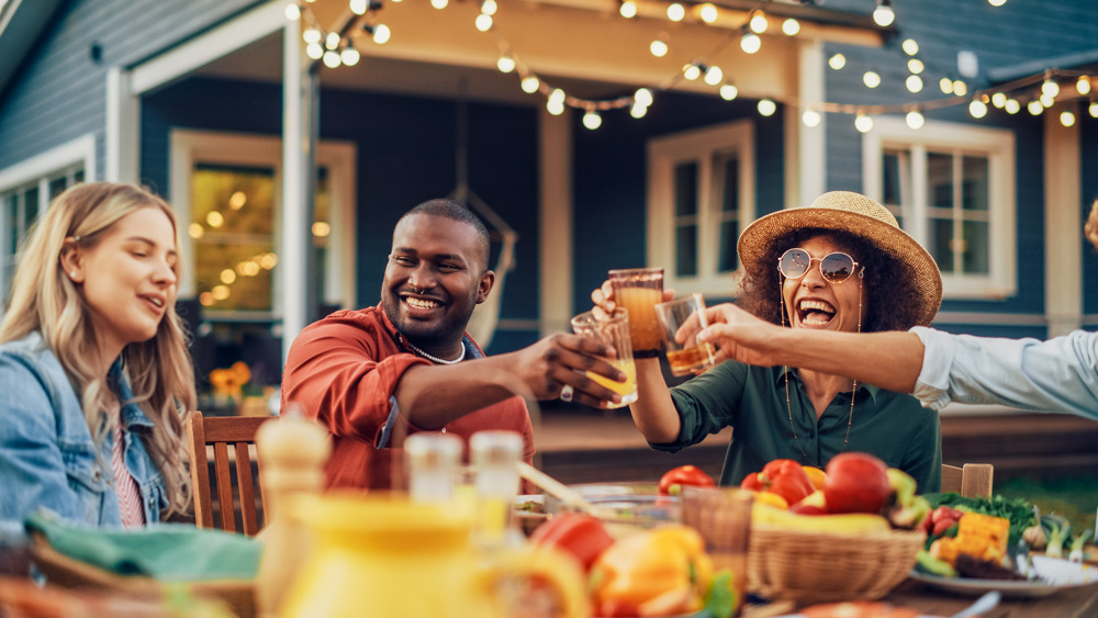 friends raising their glasses in a toast